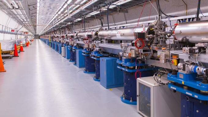Electrons accelerated by SLAC's linear accelerator enter the LCLS undulator hall and run a gauntlet of 32 powerful undulators.
